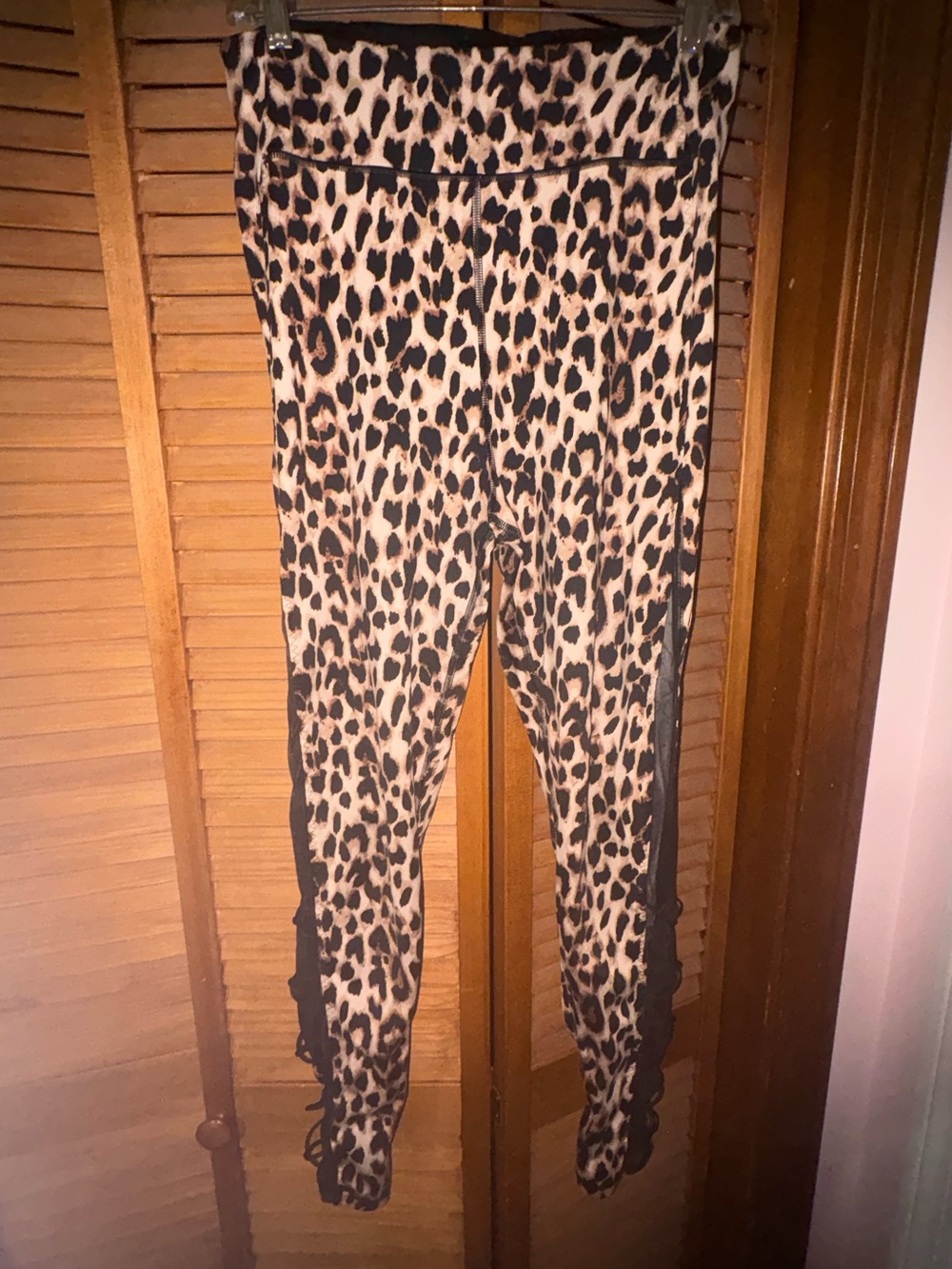 Victoria’s Secret leopard criss cross leggings.